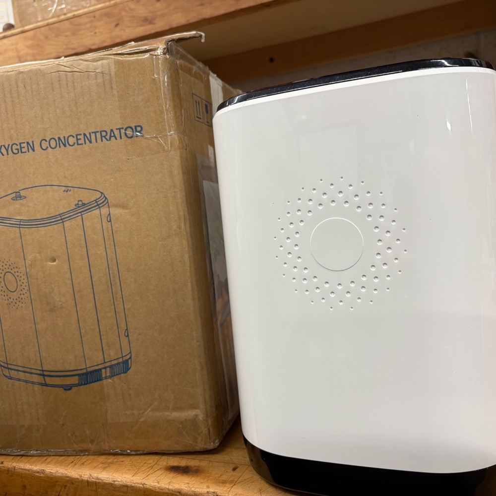 White Portable Oxygen Concentrator Unit